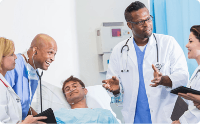 Doctors reviewing a patient's care